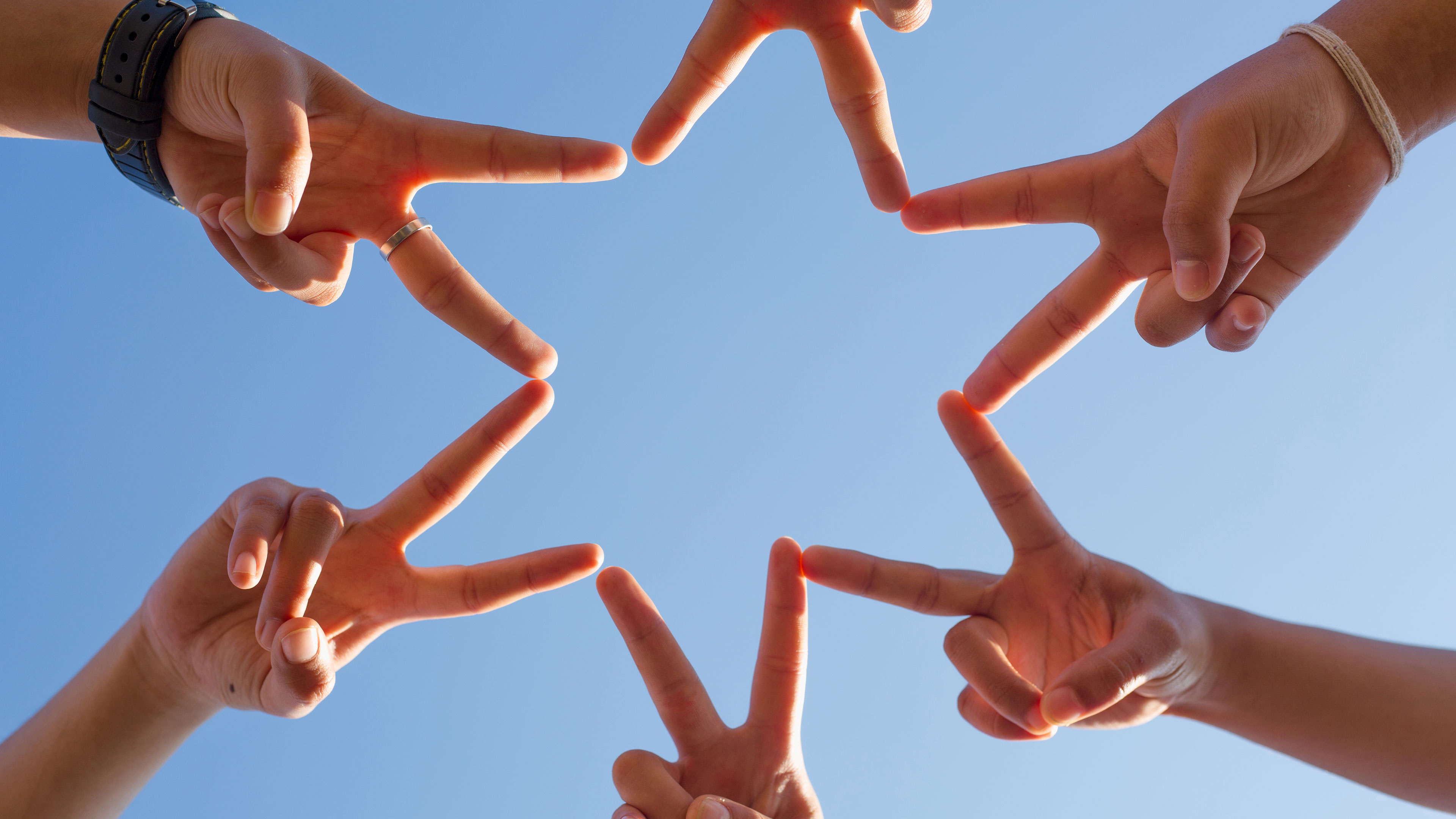 Fingre der i fællesskab danner en stjerne